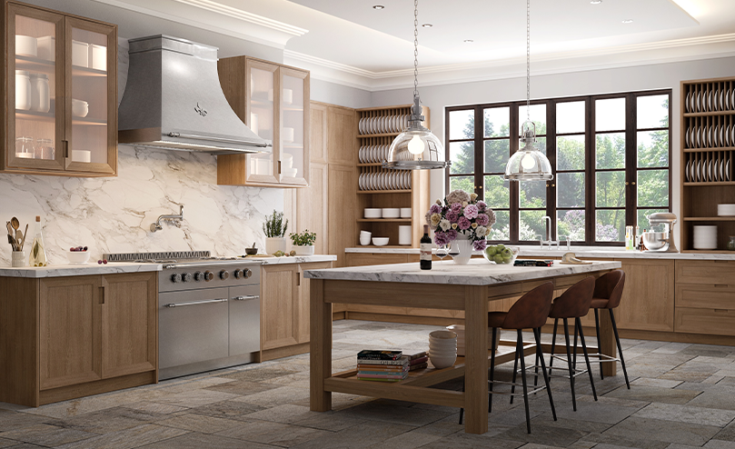 Silver classic kitchen ranges including French stove, burners and silver luxury kitchen hood above cooking ranges. Wooden hanging and base cabinets across Kitchen