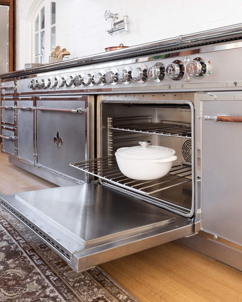 Silver French kitchen ranges with inbuilt oven and silver burners