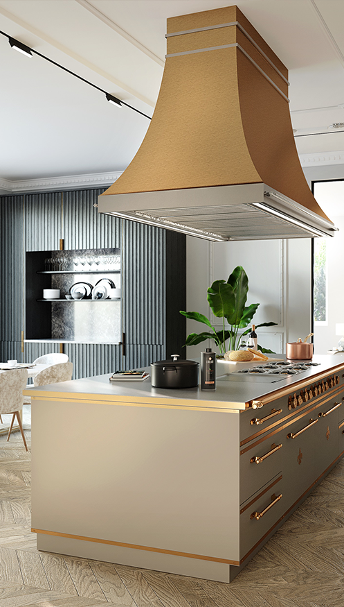 L'Atelier Paris custom champagne-toned kitchen island with gold trim and hardware, featuring a large textured gold ventilation hood and professional integrated cooktop.