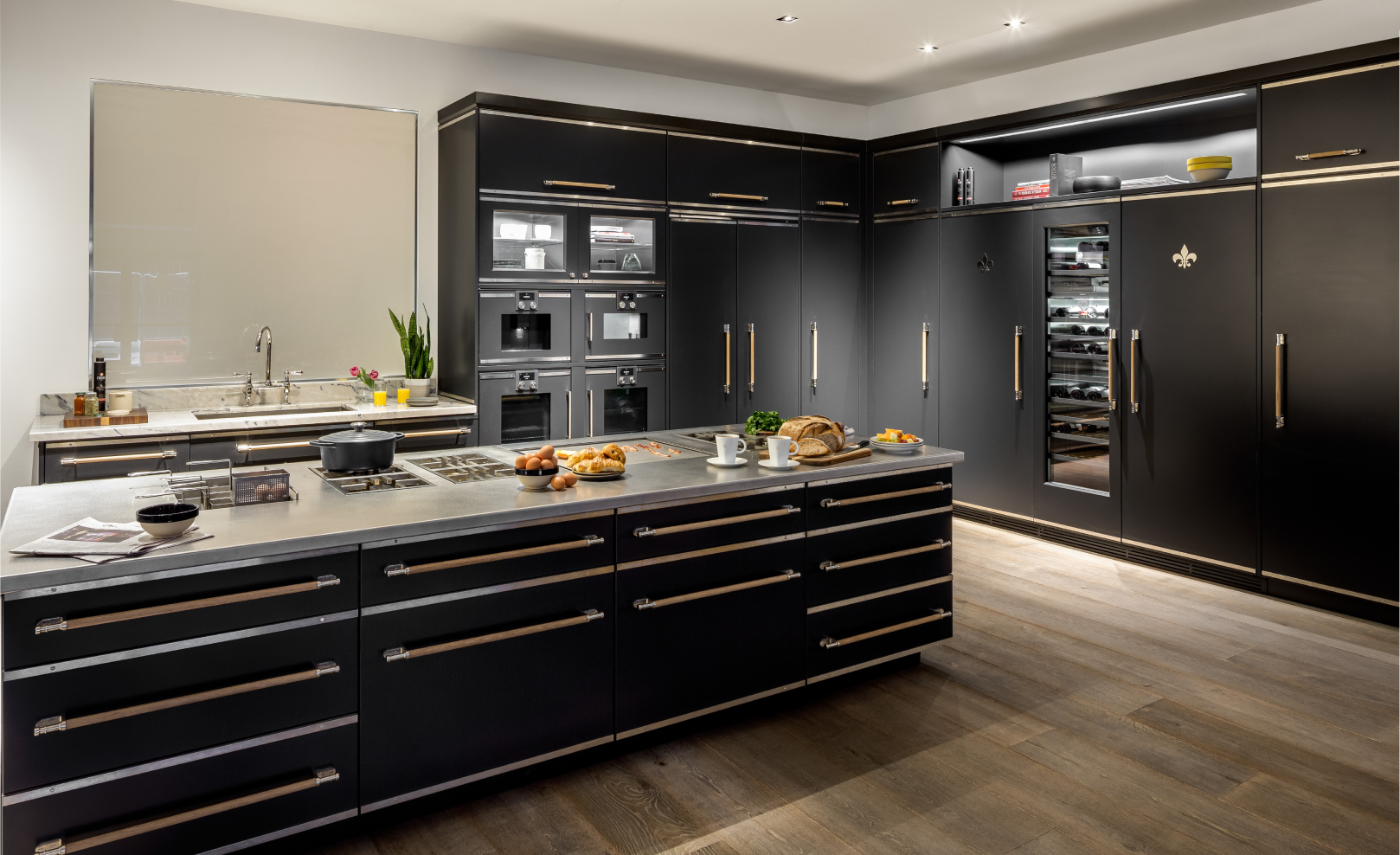 Black Kitchen Cabinets With Black Base Cabinets and Silver Countertop