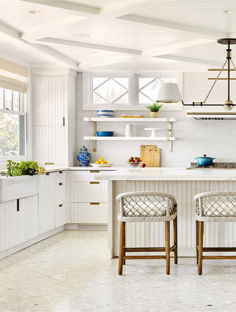 High end kitchen design of white kitchen with white French kitchen ranges, white cupboards, white kitchen cabinets