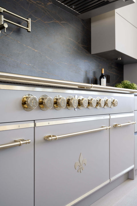 L’Atelier Paris French Kitchen Ranges in white color with golden burners and handles