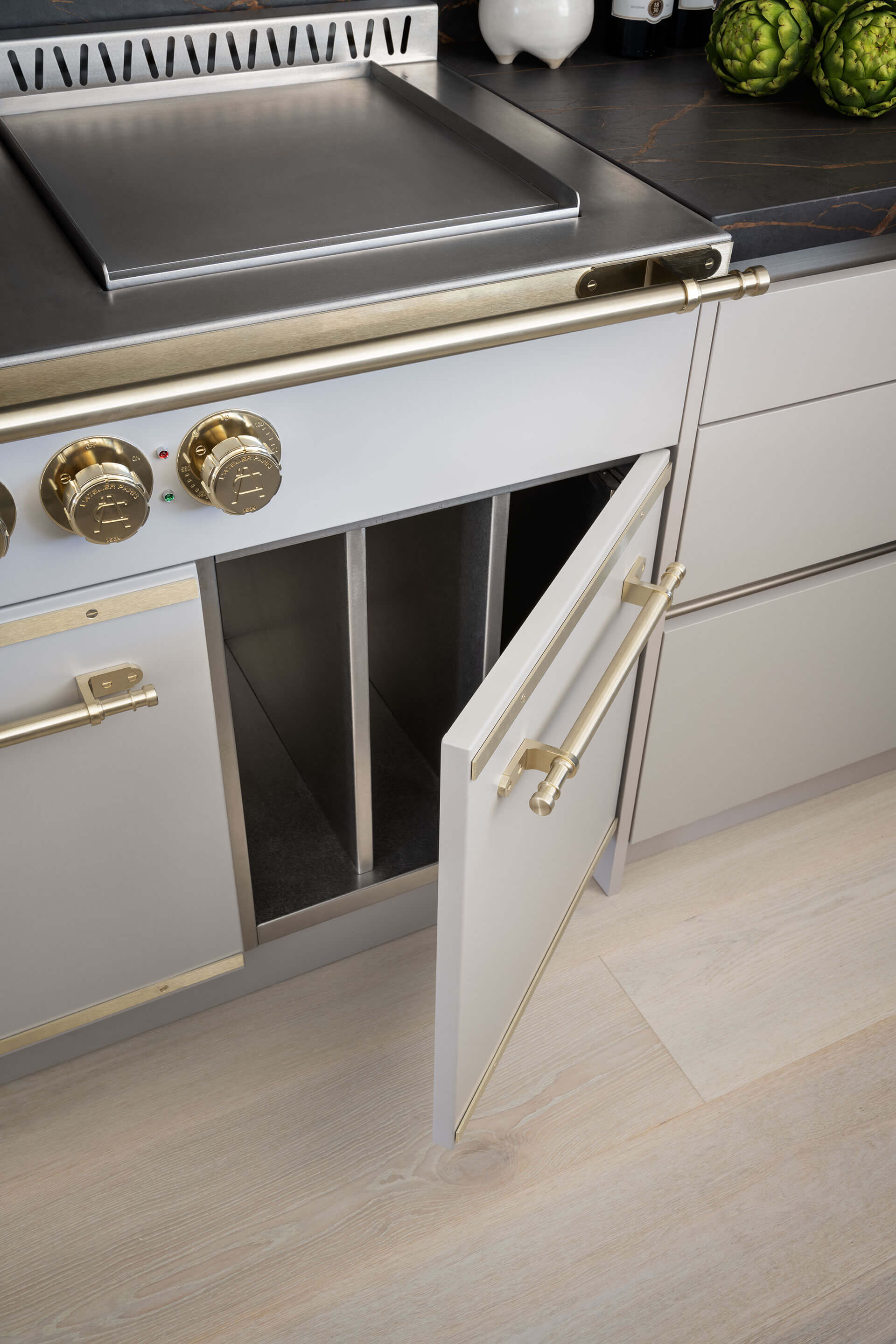 Luxury kitchen cabinets in white colors with golden handles